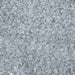 Close-up texture of sparkling light silver pearl cocktail rimming sugar crystals.