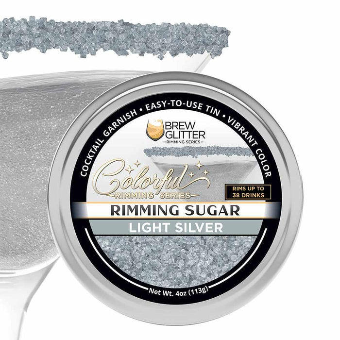 Light silver cocktail rimming sugar in a 4oz tin with a martini glass rimmed in sparkling silver sugar crystals.