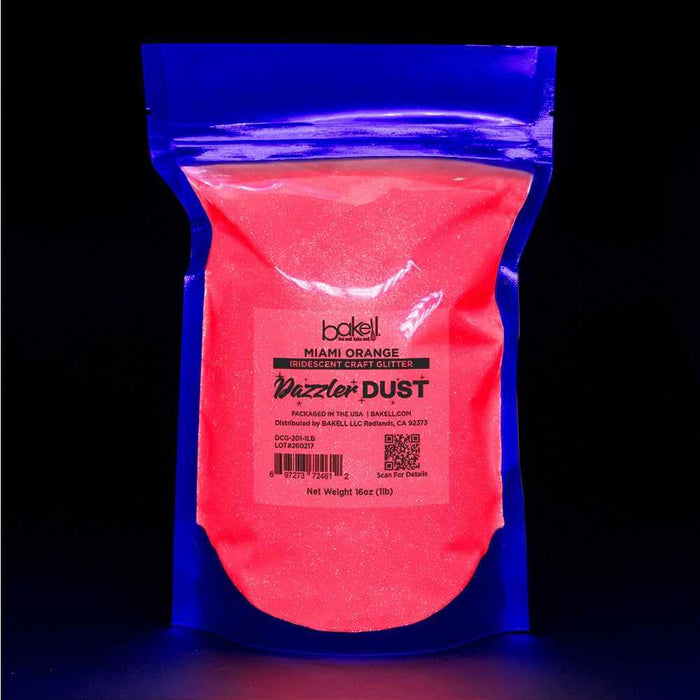 Miami Orange Dazzler Dust UV reactive iridescent craft glitter in a 1lb blue bag.