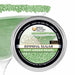 4oz tin of Mint Green Pearl cocktail rimming sugar with a decorative label, shown with a sugar-rimmed martini glass.