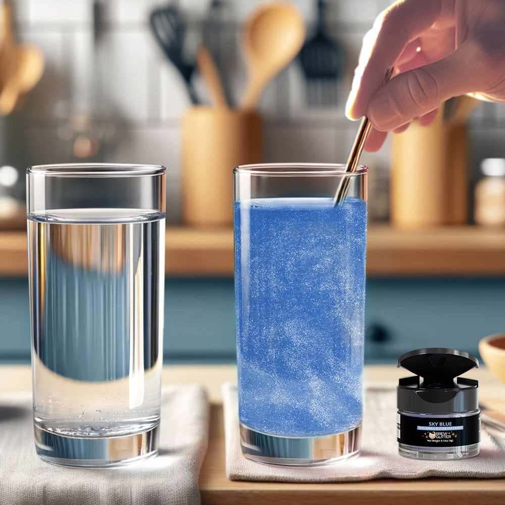 Hand stirring shimmering neon blue edible glitter into a glass of water, next to a clear water glass and a Tinker Dust pump.