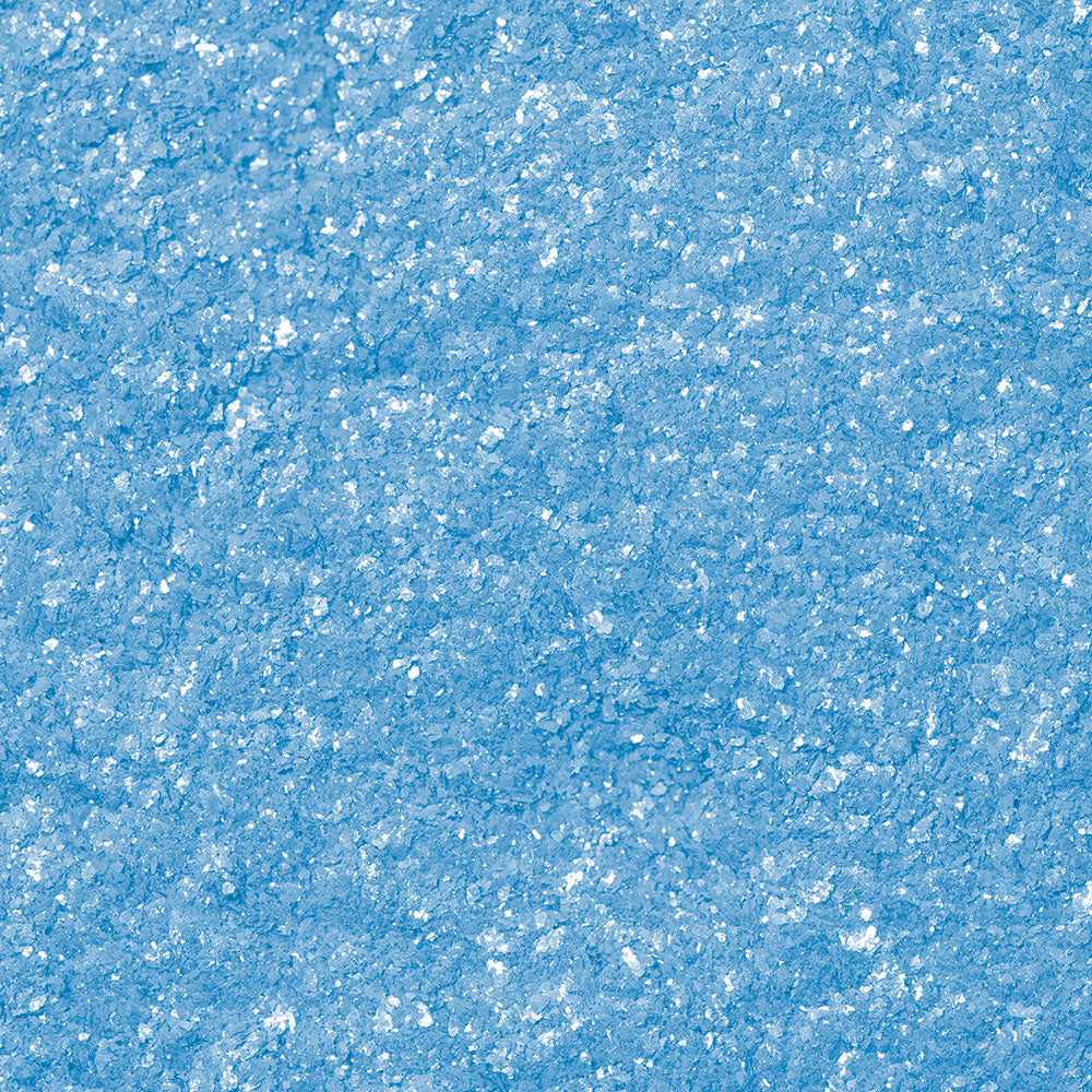 Close-up of sparkling neon blue edible glitter, Tinker Dust, for food and desserts.
