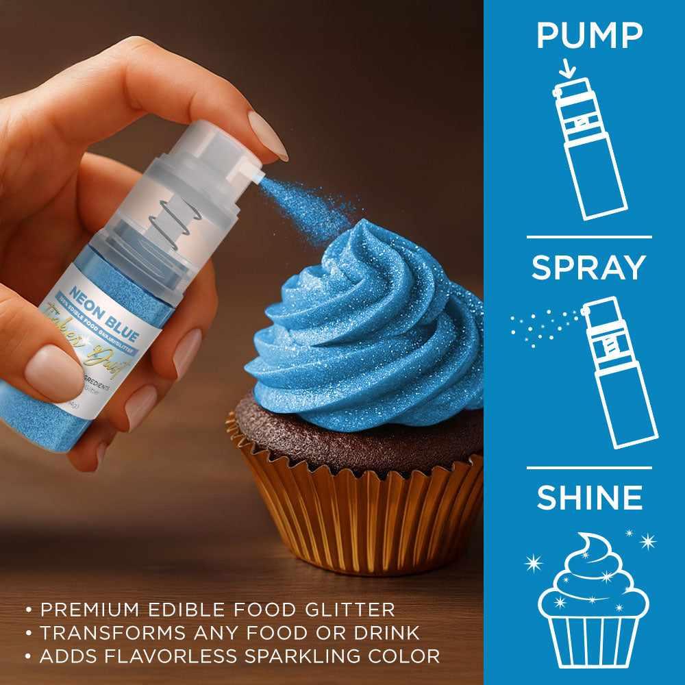 Hand spraying neon blue edible glitter from a 4g Tinker Dust pump onto a frosted chocolate cupcake.