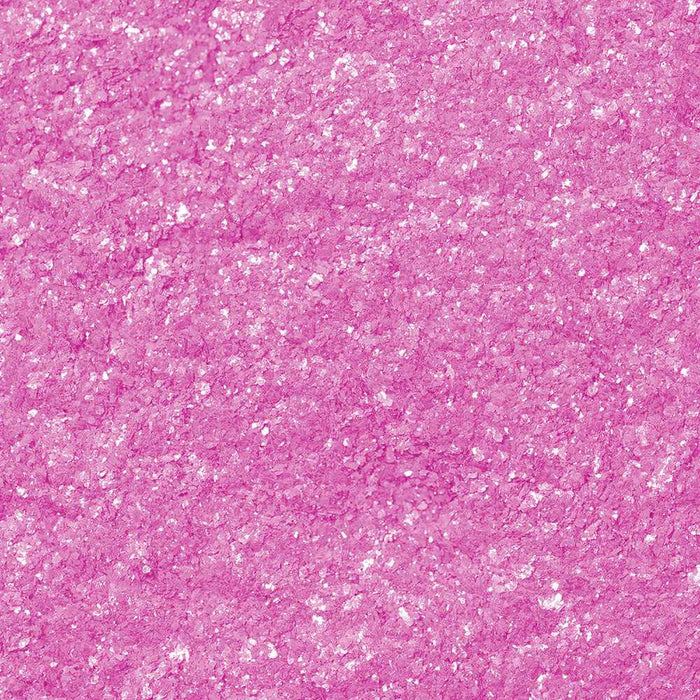 Close-up of vibrant neon pink Tinker Dust edible glitter with sparkling flakes.