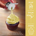 Hand sprinkling bright neon yellow Tinker Dust edible glitter onto a chocolate cupcake.
