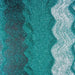 Ocean blue-green ultrafine metallic craft glitter with wavy white accents, shimmering on a dark background.