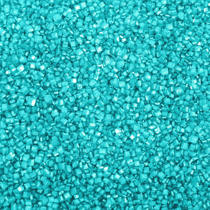 Bright ocean blue cocktail rimming sugar crystals with a sparkling, granulated texture for decorating drink glasses.