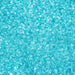 Vibrant ocean blue cocktail rimming sugar crystals with a shimmering, translucent texture for drink garnishes.