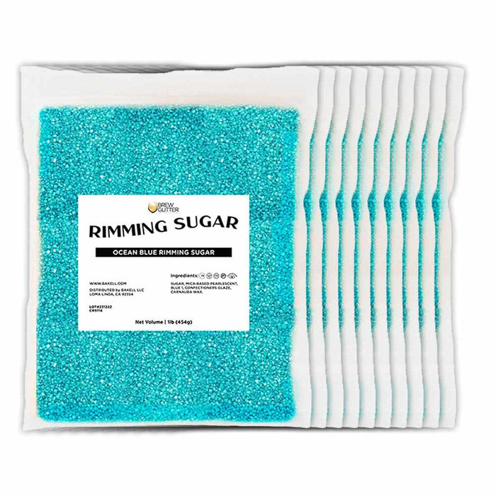 Ten 1 lb bags of vibrant ocean blue cocktail rimming sugar with Brew Glitter labels arranged in a row.