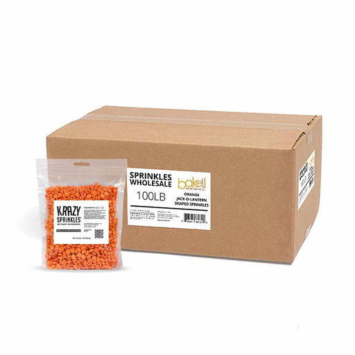 direct shot of bulk orange jack o lantern shaped sprinkles in front of large shipping box