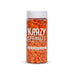 Krazy Sprinkles orange jack-o-lantern shaped sprinkles in a clear plastic container with a white lid.
