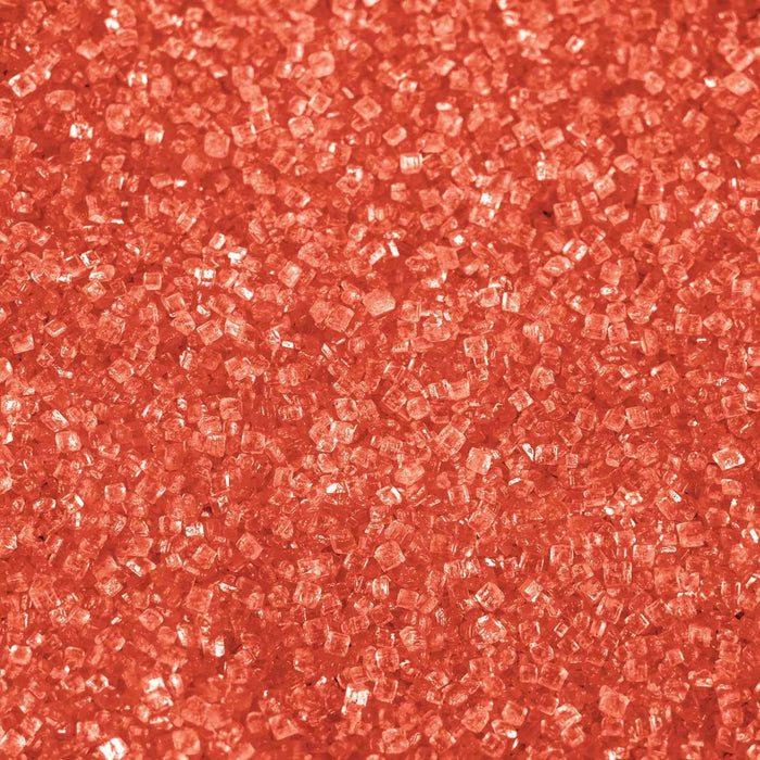 Vibrant orange shimmering cocktail rimming sugar with a coarse, crystalline texture for decorating drink glasses.