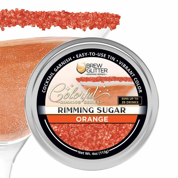Orange Brew Glitter cocktail rimming sugar in a round aluminum tin with a vibrant, sparkling orange sugar-rimmed glass.