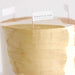 Pale gold luster dust in a clear container with a small flag labeled "Bakell Pale Gold.