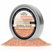 Round tin of Peach Pearl rimming sugar with a pile of shimmering orange-peach cocktail garnish crystals.