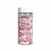product shot of sprinkles bottle filled with pink and white baby feet decorations