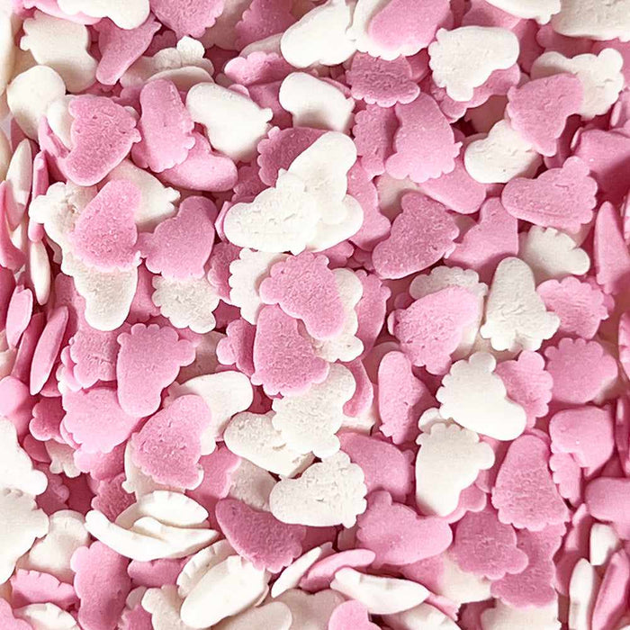 close up of pink and white baby feet sprinkles