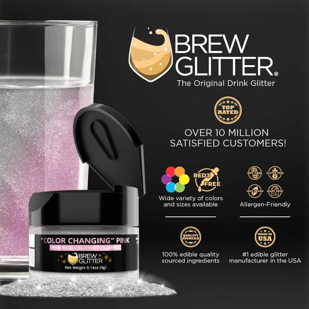 Pink Color Changing Brew Glitter in a small black jar, next to a glass of water and loose glitter.