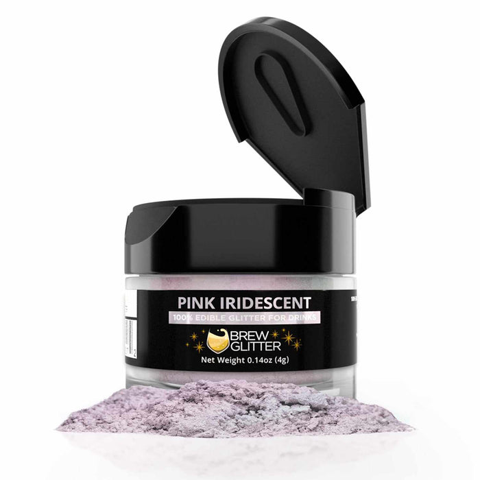 4g jar of pink iridescent edible Brew Glitter with a black flip-top lid and a pile of shimmering powder in front.