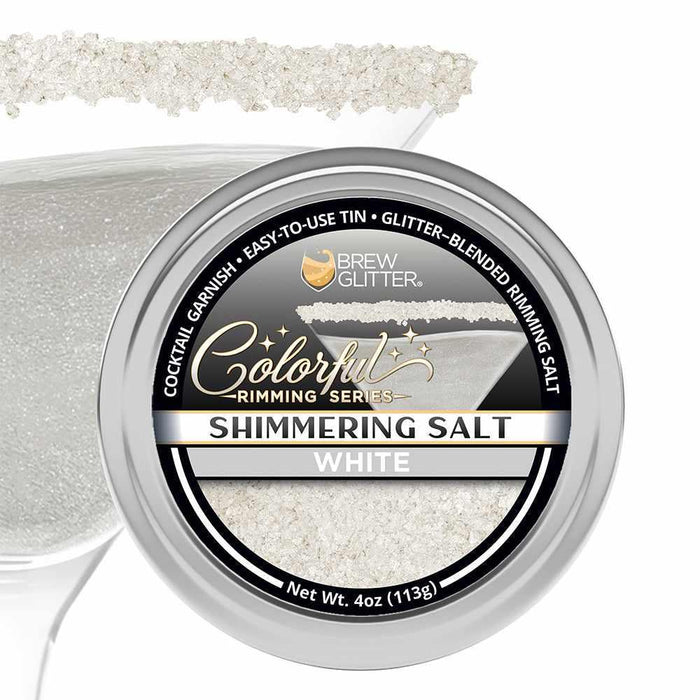 White shimmering cocktail rimming salt in a 4oz round metal tin, shown with a salt-rimmed glass garnish.