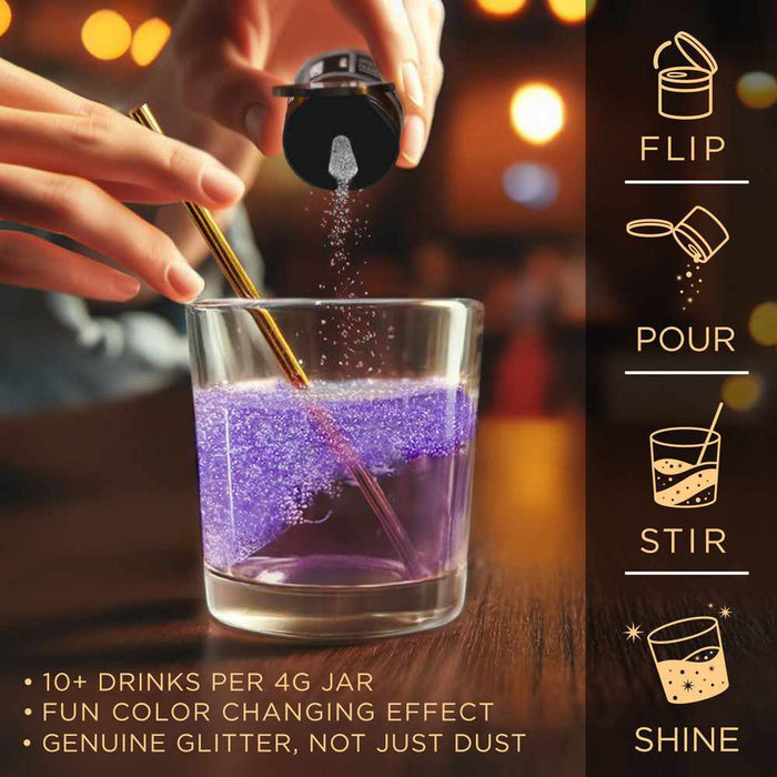 Hand pouring white color-changing brew glitter into a glass of purple liquid with a gold straw.