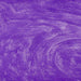 Vibrant purple edible drink glitter swirling in a liquid, creating a shimmering, sparkling effect.