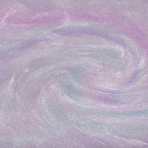 Swirling purple and iridescent holographic edible glitter creating a shimmery, rainbow-effect liquid texture.