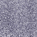 Close-up of shimmering purple pearl cocktail rimming sugar with a crystalline, sparkling texture for drink garnishing.