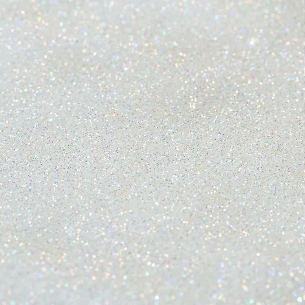 Close-up of Rainbow Pixie Ultrafine Iridescent Craft Glitter Dazzler Dust, sparkling white with subtle opalescent hues.