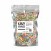 red blue green squiggly confetti sprinkles in a pound bag