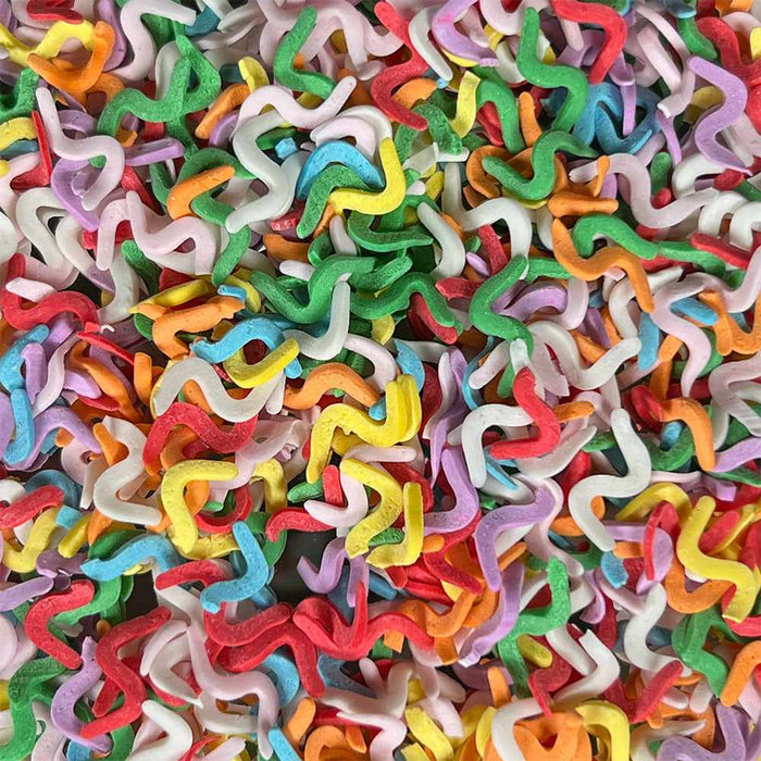 enlarged view of rainbow squiggly confetti sprinkles