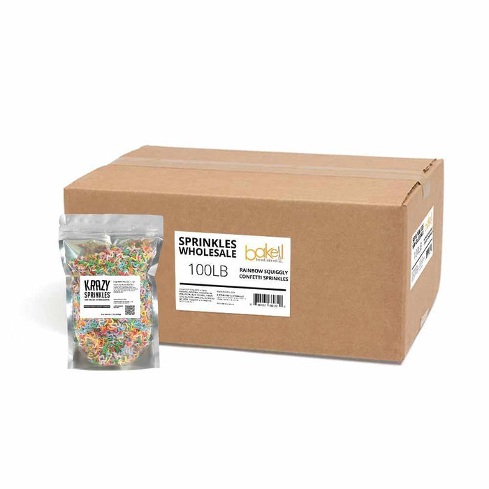 a pound of rainbow squiggly confetti sprinkles near a box