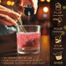Hand pouring white color-changing brew glitter into a glass of red liquid with a gold straw, showing "Flip, Pour, Stir, Shine" steps.