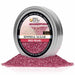 Red Pearl cocktail rimming sugar in a 4oz silver tin with a vibrant, sparkling pink sugar pile in front.