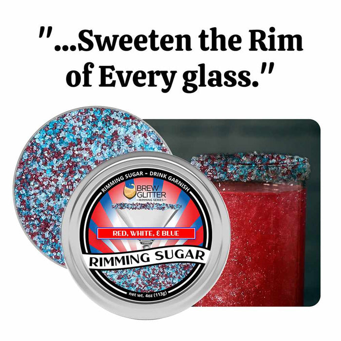 Red, white, and blue rimming sugar in a metal tin, next to a glass with a red drink and sugar-rimmed edge.