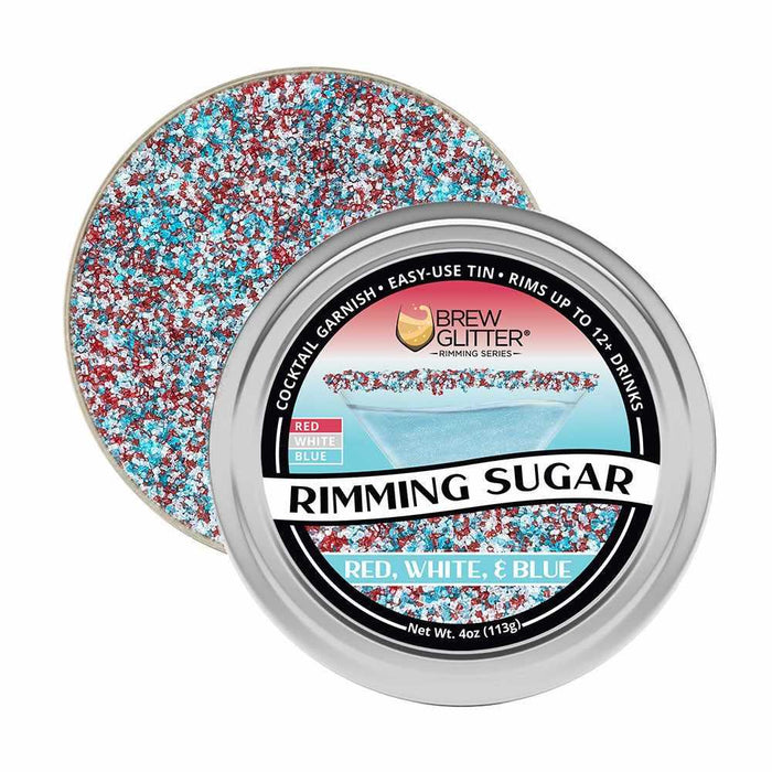Red, white, and blue cocktail rimming sugar in a round metal tin, open to show the vibrant sprinkles.