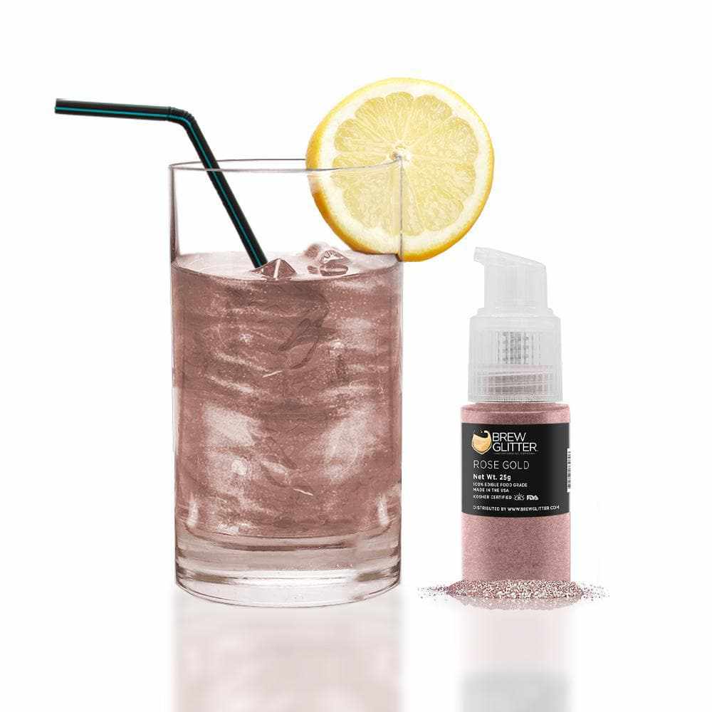 Rose gold edible glitter spray pump next to a shimmering rose gold drink with lemon and straw.