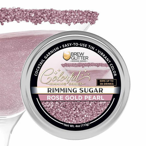 Rose Gold Pearl cocktail rimming sugar in a 4oz tin with a decorative glass rim garnish.