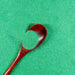 Sea green ultrafine iridescent craft glitter with a wooden spoon holding a small pile.