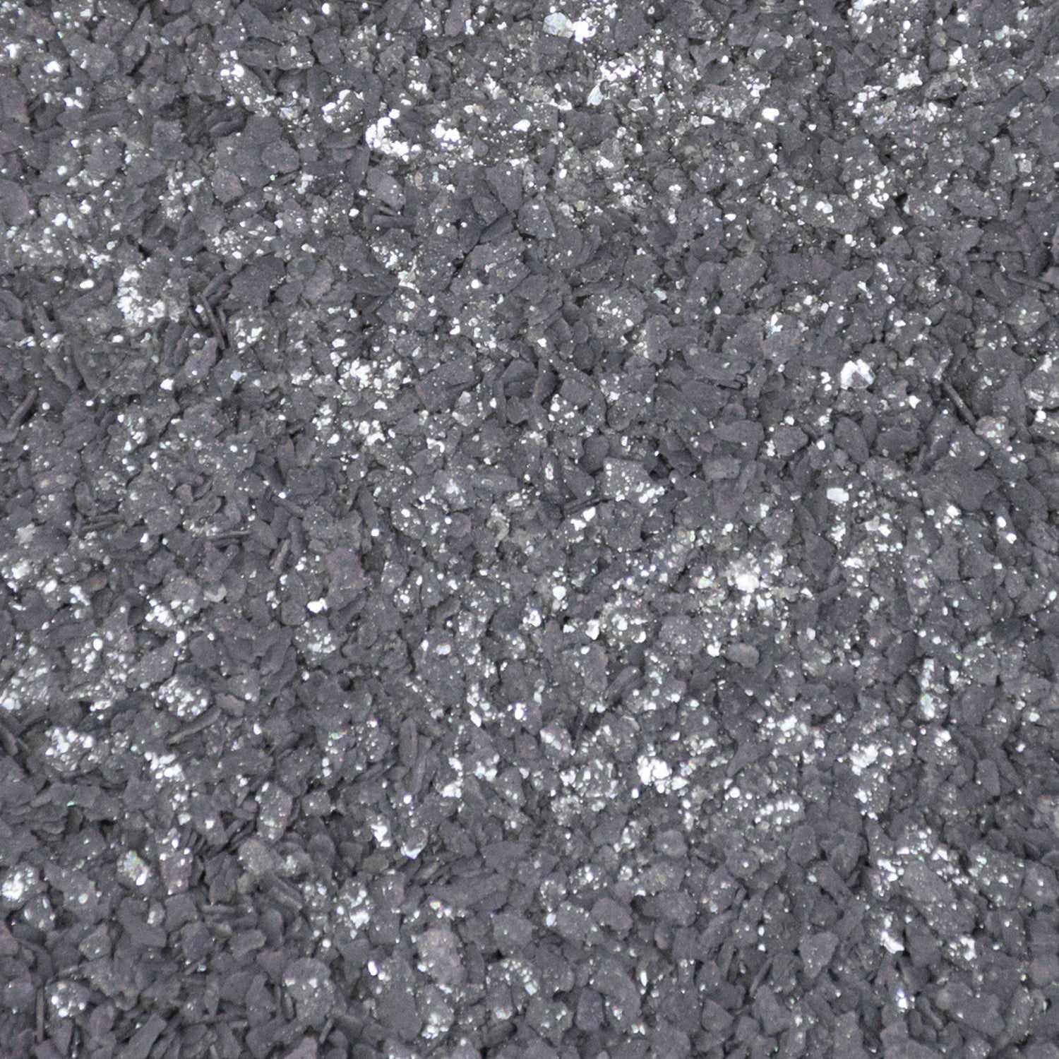 Coarse, shimmering black cocktail rimming salt with sparkling crystalline texture for drink garnishing.