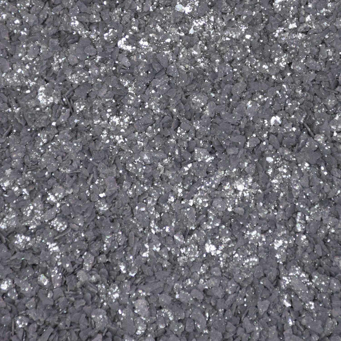Coarse, shimmering pitch-black cocktail rimming salt with a glittery, crystalline texture for garnishing drinks.