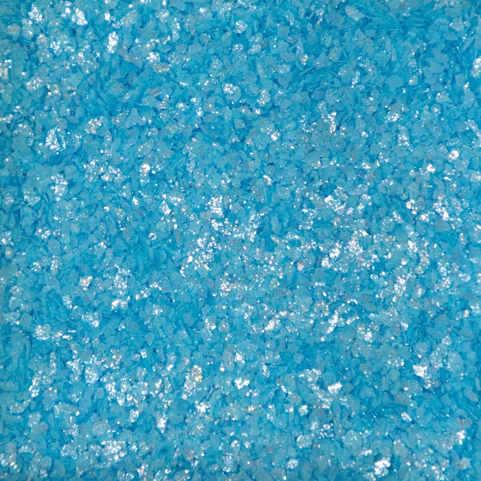 Coarse ocean blue cocktail rimming salt with a shimmering, crystalline texture for garnishing glassware.