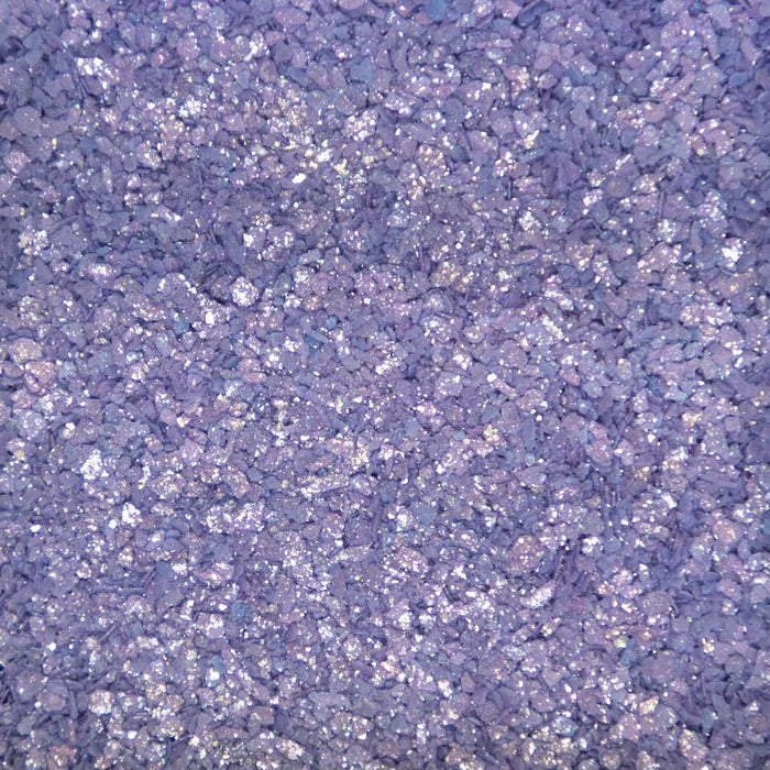 Close-up texture of shimmering deep purple cocktail rimming salt with sparkling crystalline grains.