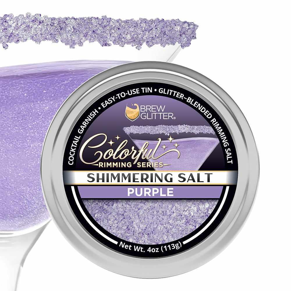 Brew Glitter shimmering deep purple cocktail rimming salt in a 4oz tin, shown with a matching purple salt-rimmed glass.
