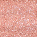 Coarse rose gold cocktail rimming salt with a shimmering, metallic finish for decorating glassware.