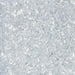 Close-up texture of shimmering silver cocktail rimming salt with sparkling, coarse crystalline grains.