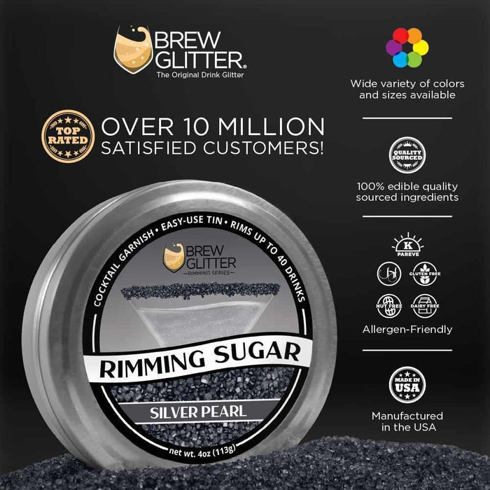 Brew Glitter Silver Pearl Rimming Sugar in a round tin, surrounded by black sugar crystals.