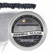 4oz tin of Brew Glitter Silver Pearl Rimming Sugar with a cocktail glass rimmed in black sugar.