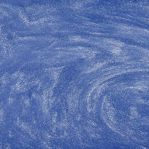 Swirling sky blue edible glitter particles creating a shimmering, metallic effect in a liquid drink base.