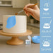 Hand painting a white cake with soft blue luster dust, showing mix, paint, and shine steps.